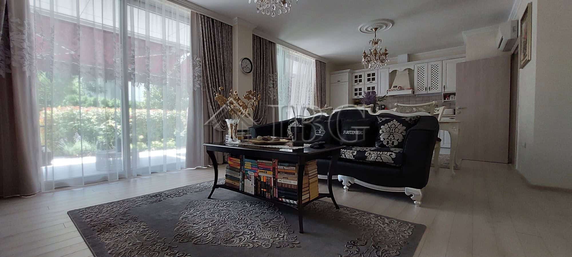 Spacious living room of a luxury two-storey townhouse in Sarafovo, featuring modern decor and large.
