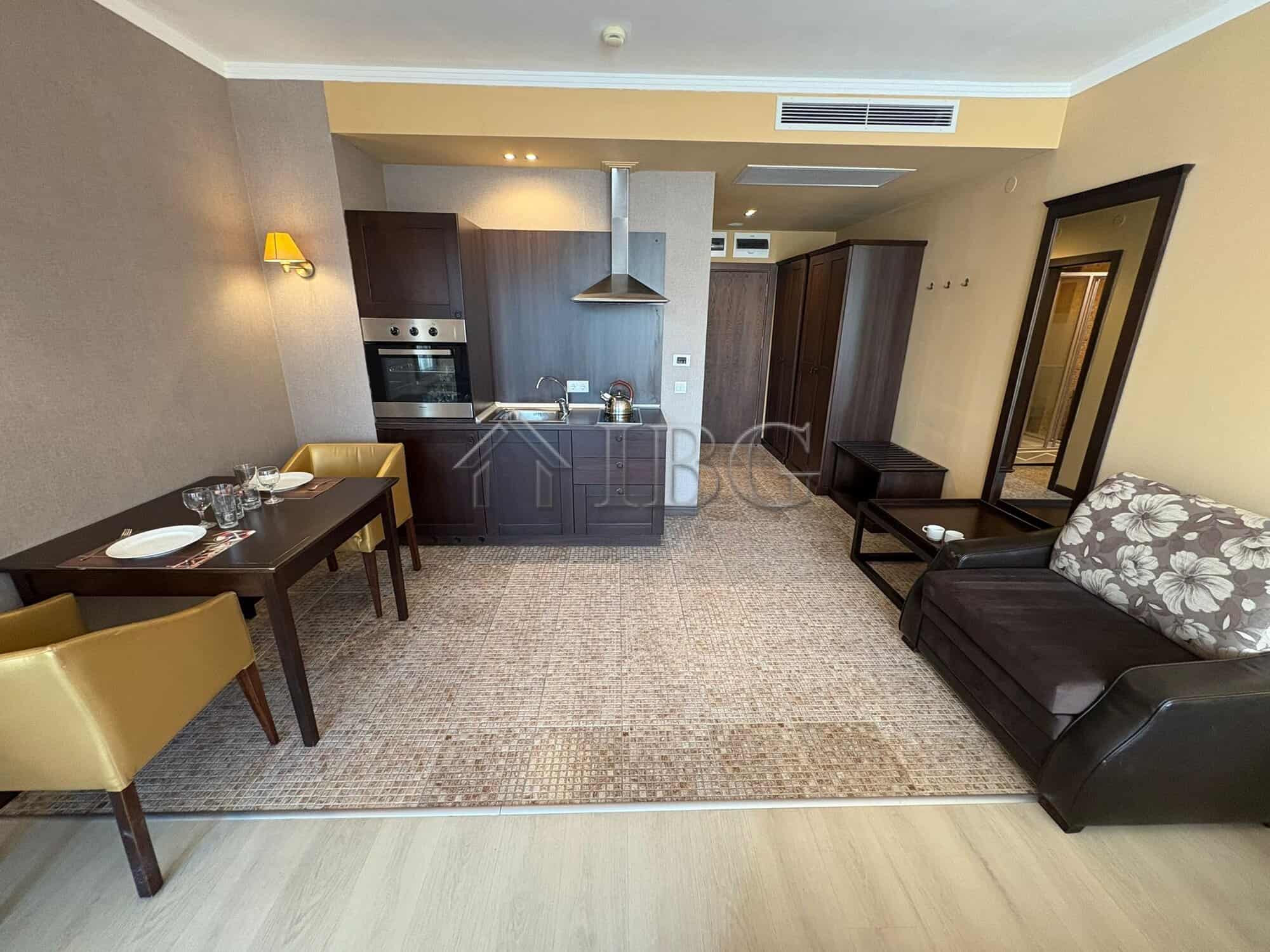 Spacious Studio with Pool View | Royal Beach Barceló Modern studio apartment with pool view, open-plan kitchen, and living area in Sunny Beach.