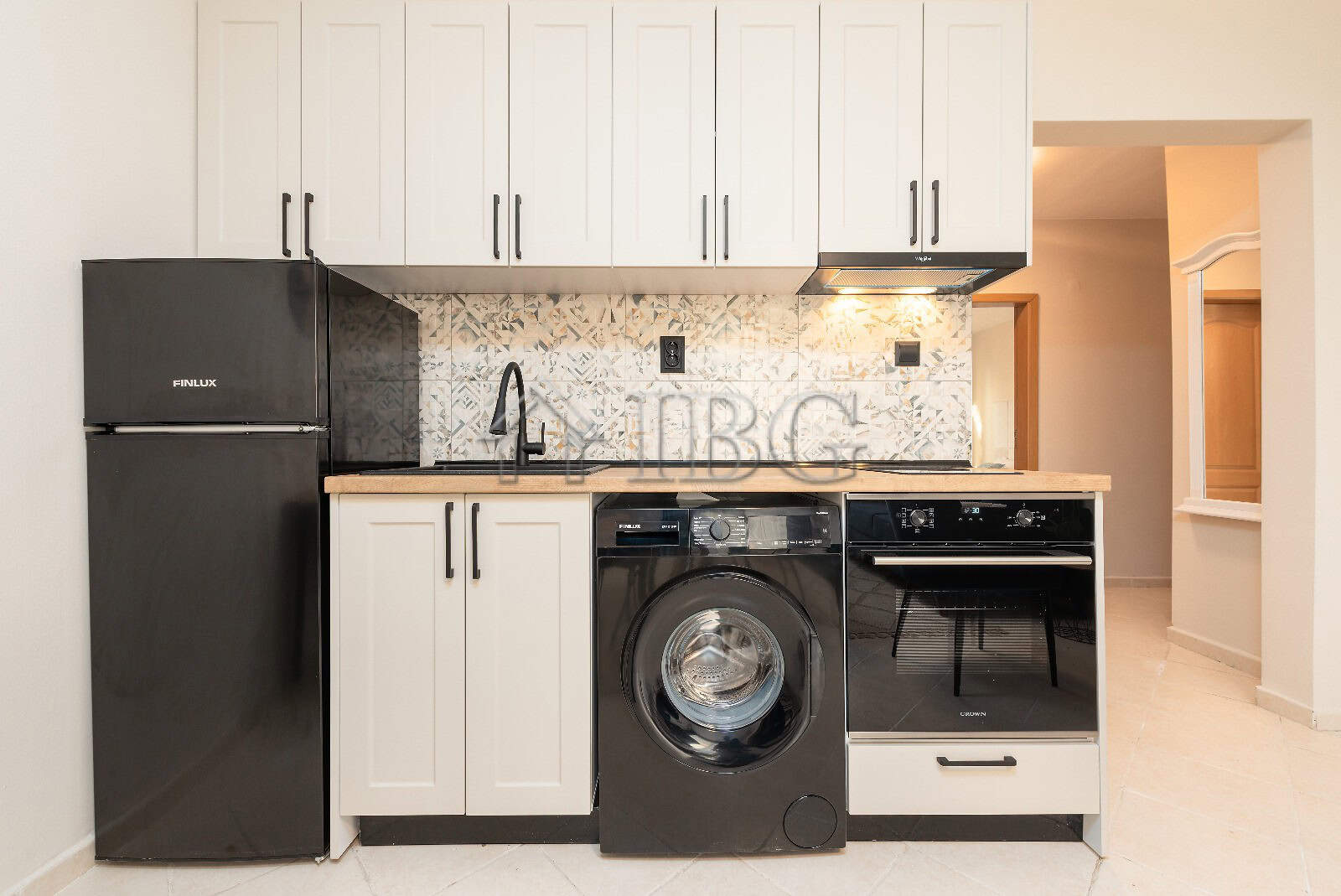 Modern kitchen with appliances in Sunny Beach.