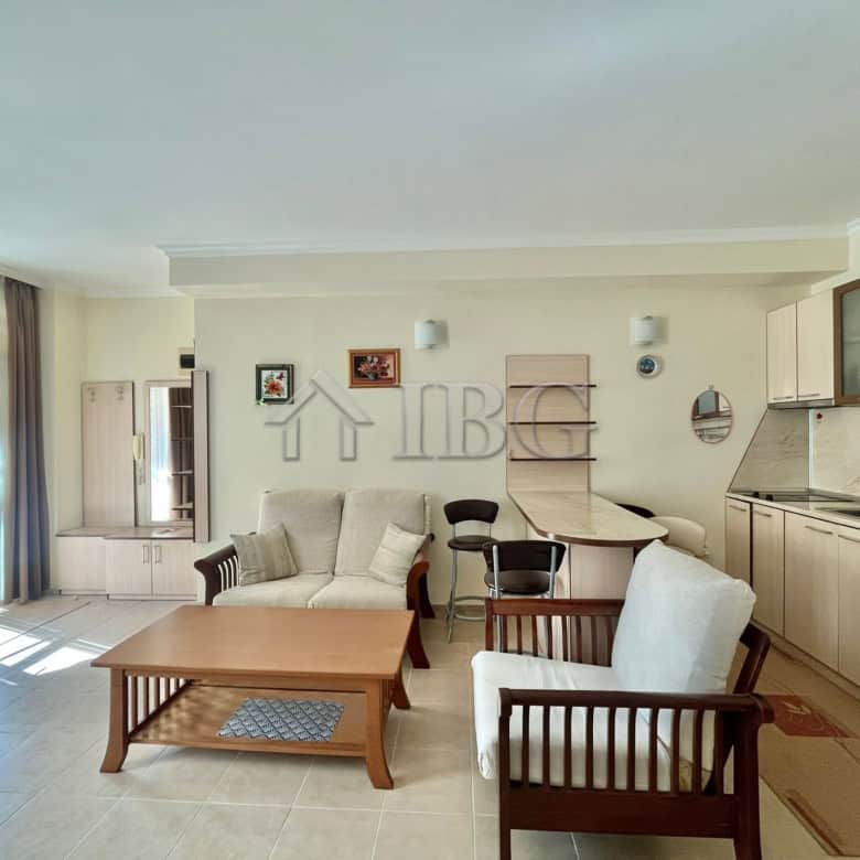 Bright living room with pool view in Sveti Vlas apartment.