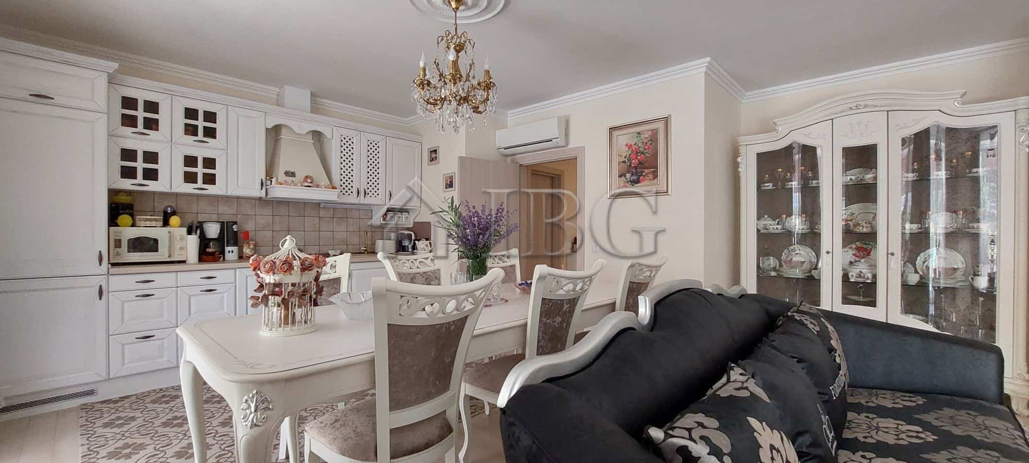 Elegant living room with modern decor and spacious dining area in Sarafovo.