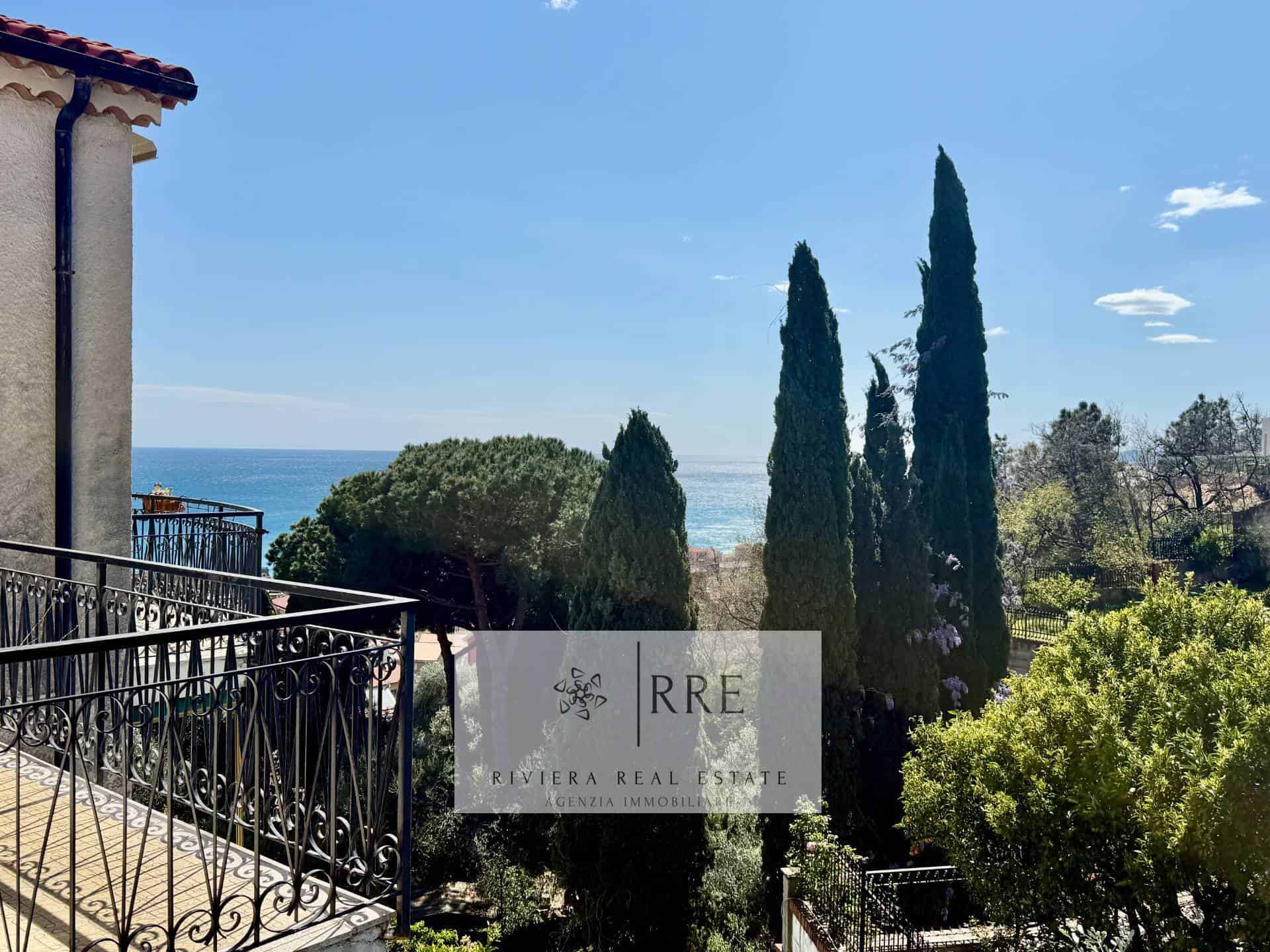 Sea view luxury property in Riviera with lush greenery.