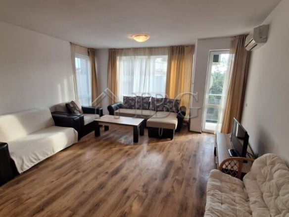 Bright living room in Mirni Complex, Sveti Vlas with modern furniture and large windows.