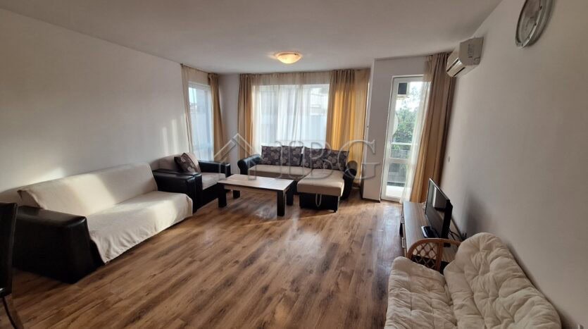 Bright living room in Mirni Complex, Sveti Vlas with modern furniture and large windows.