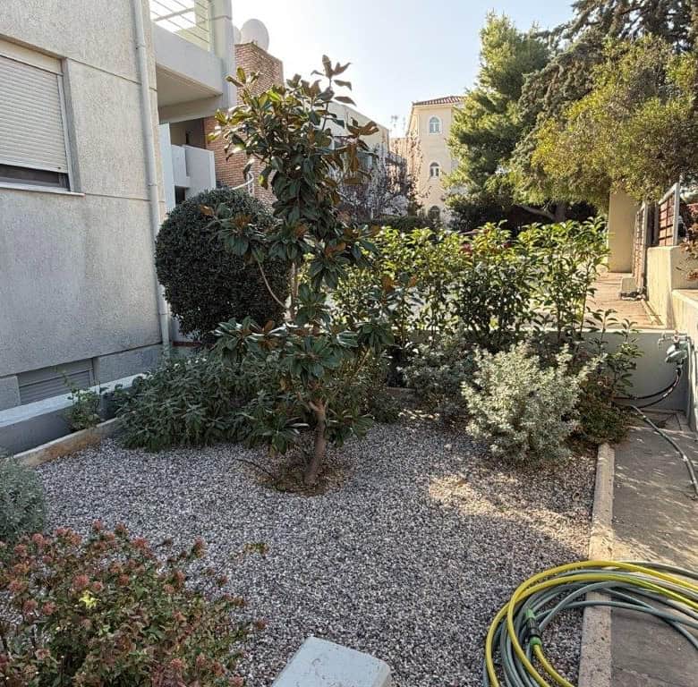 Charming outdoor garden of a luxury 3-bedroom property in Neos Voutzas, Attica, Greece, featuring lu.