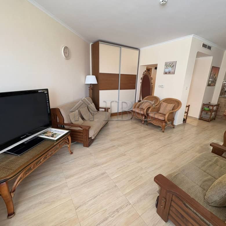 Bright living room with modern furniture and sea views in Sunny Beach.