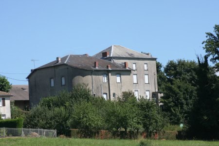 Historic building in Oradour Sur Vayres, Limousin, France, for renovation and sale.