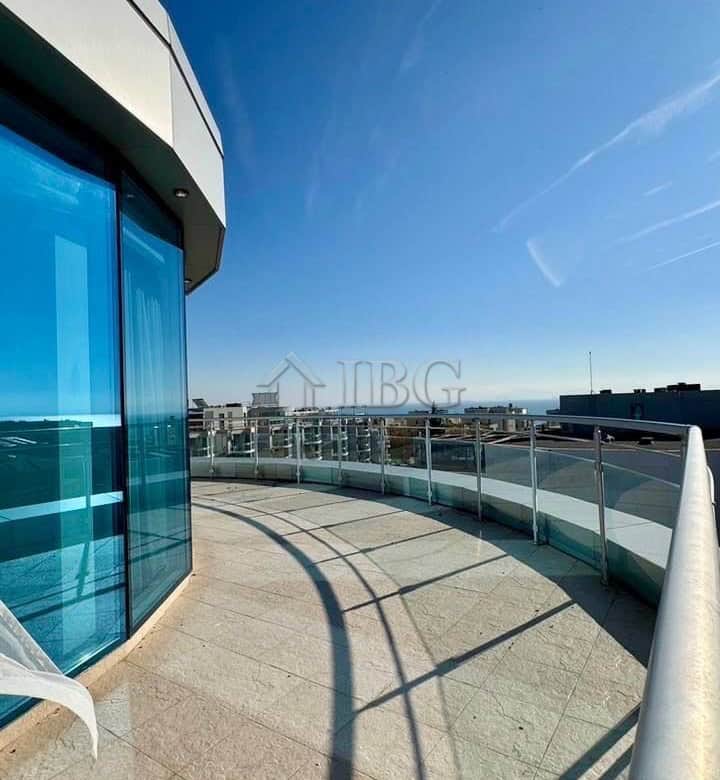 Balcony of a 237 sq. m. apartment offering stunning sea and pool views in Atlantis Resort & Spa, Sar.
