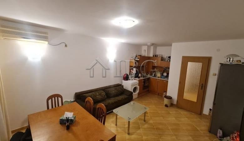 Modern two-bedroom apartment living area with kitchen in Sunny Beach.