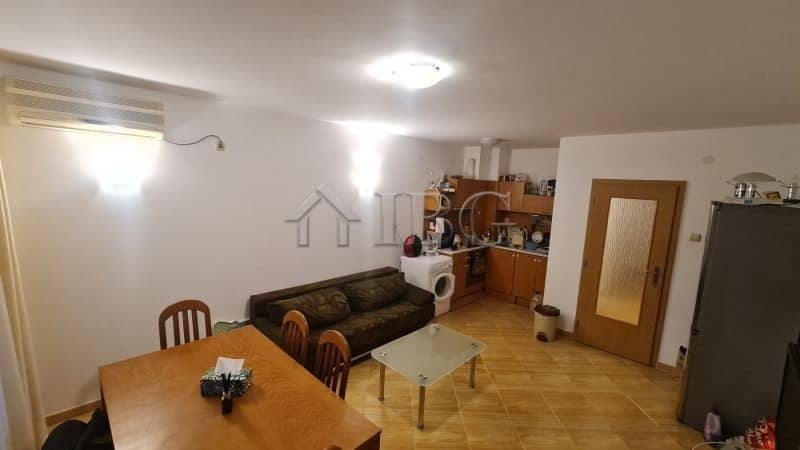 Modern two-bedroom apartment living area with kitchen in Sunny Beach.