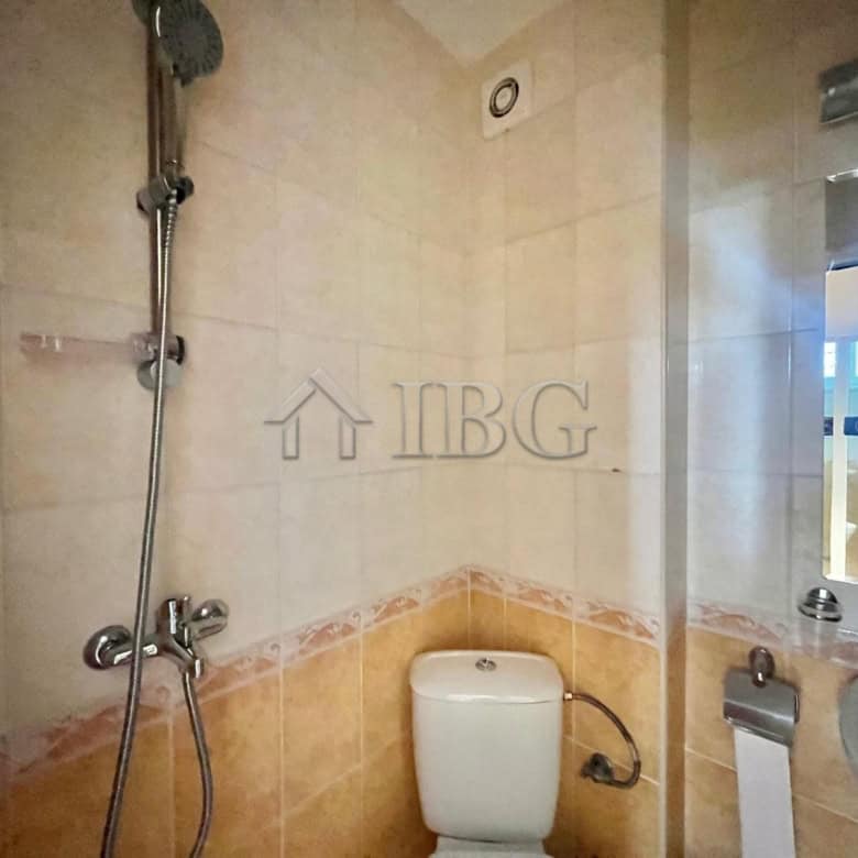 Bright bathroom with modern fixtures in a spacious Sveti Vlas apartment. Perfect for comfortable liv.
