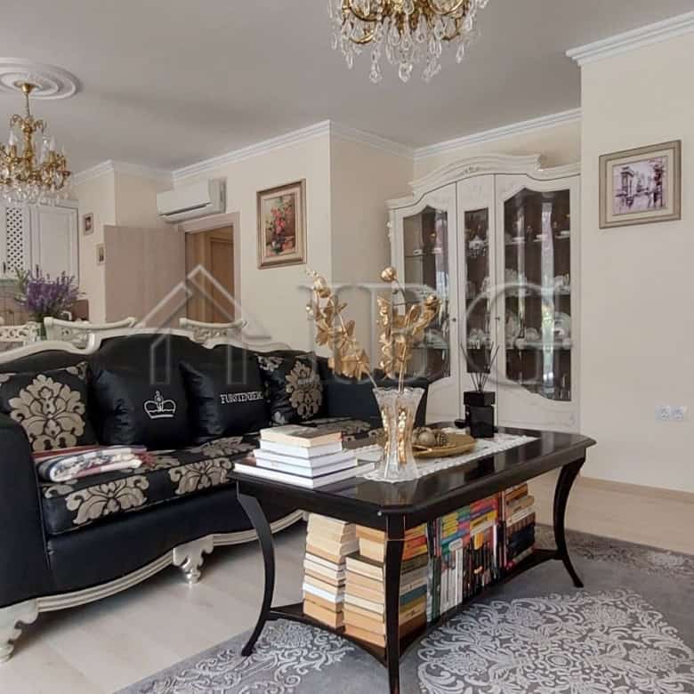 Elegant living room with modern decor and stylish furniture in Atlantis Home, Sarafovo.