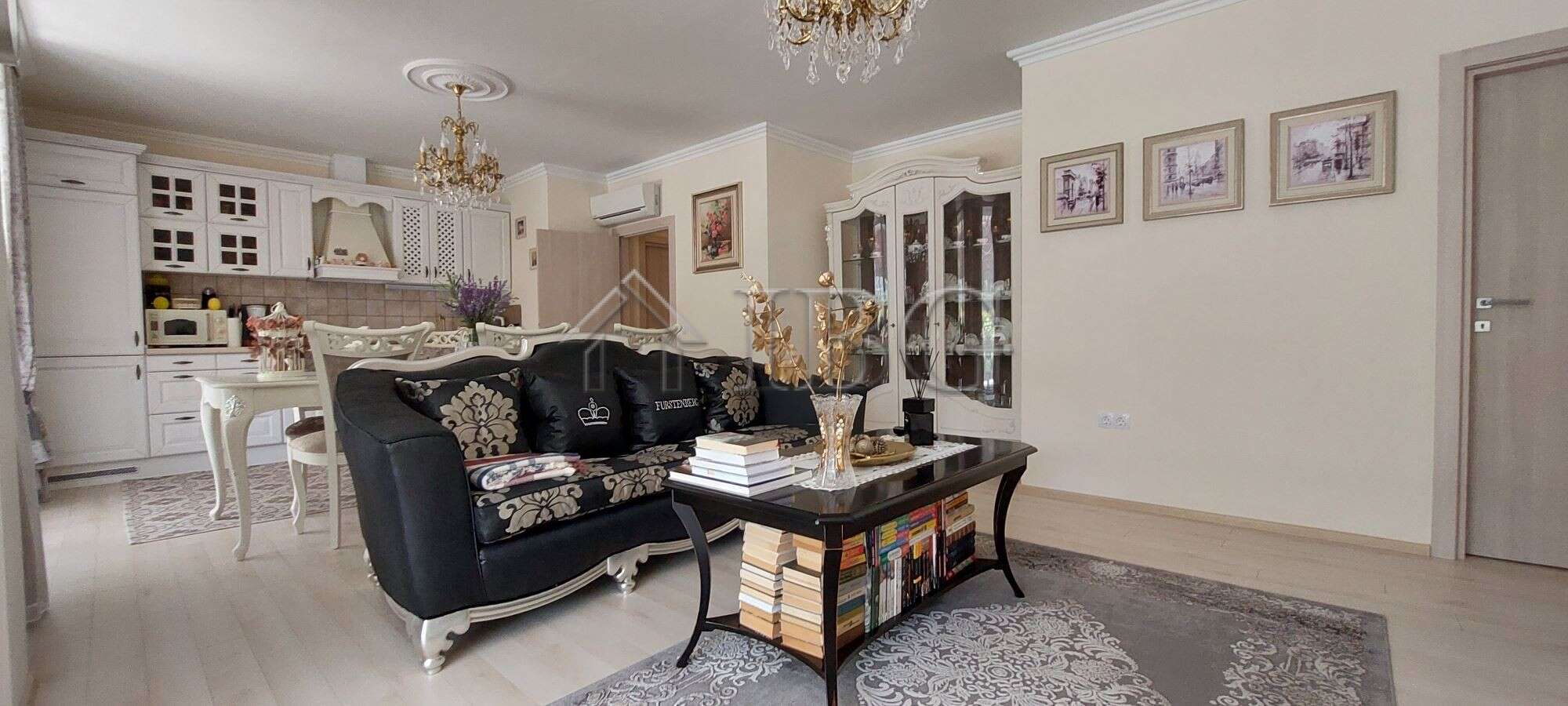 Elegant living room with modern decor and stylish furniture in Atlantis Home, Sarafovo.