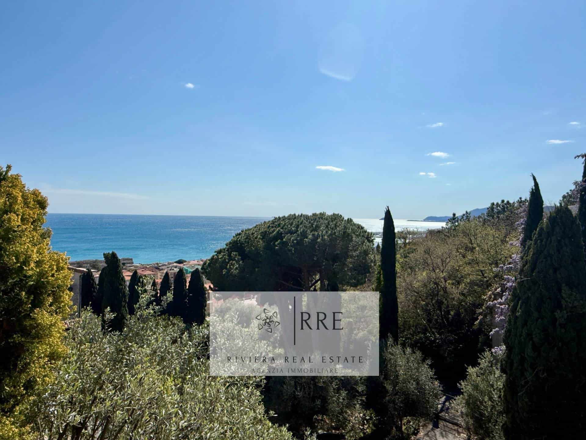Sea view property with lush greenery and coastal landscape, ideal for investment or holiday home in.
