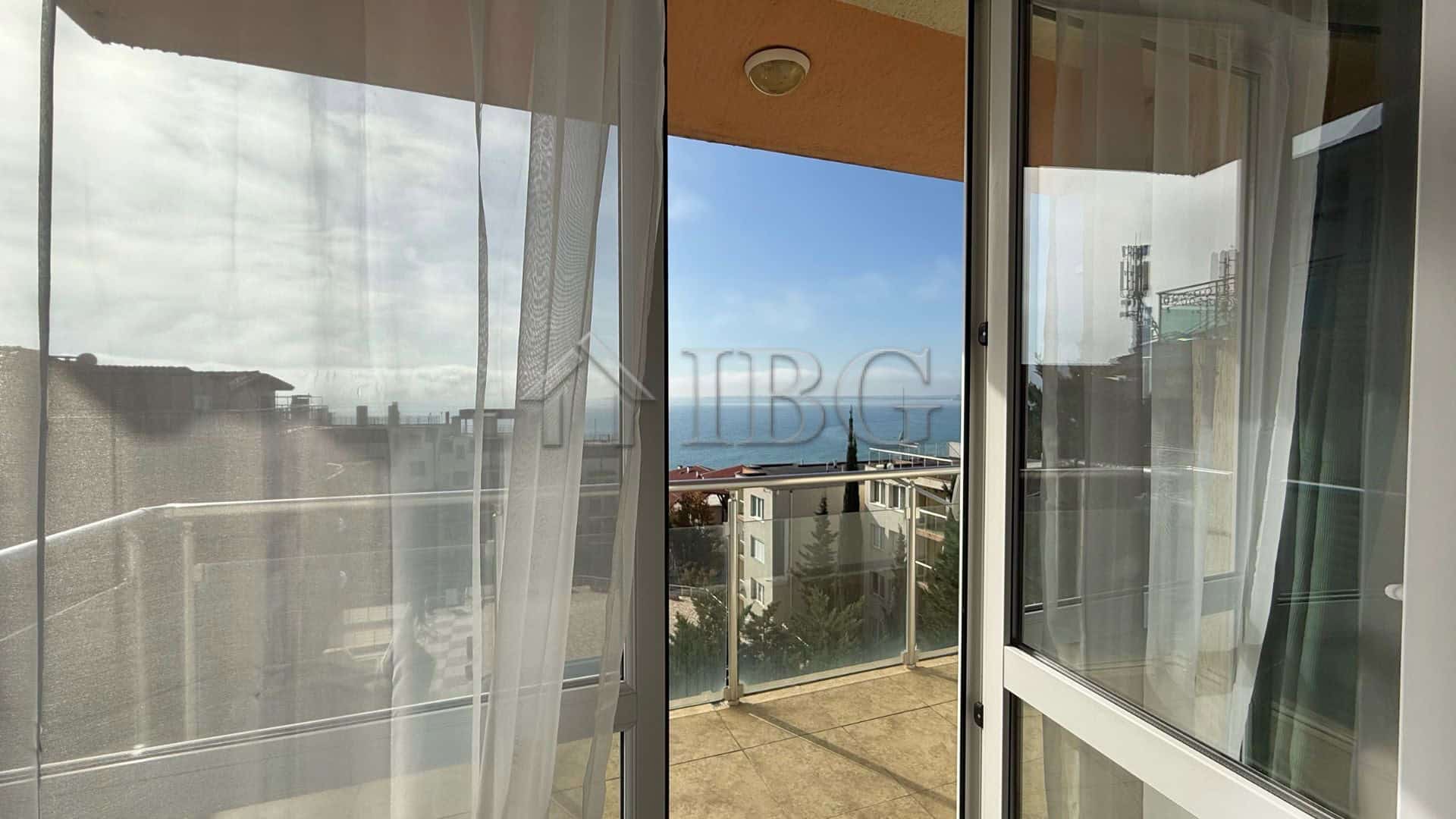 Sea view balcony of a 2-bedroom apartment in Sveti Vlas with scenic coastal vistas.
