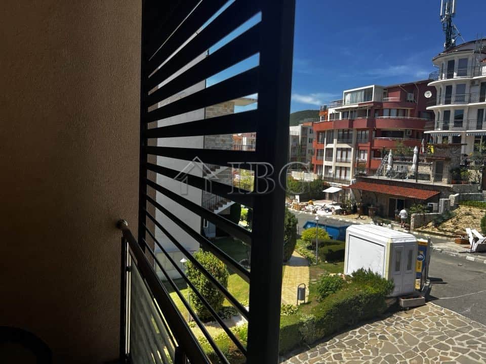 View from balcony of a 2-bedroom apartment in Sveti Vlas with sea and cityscape background.
