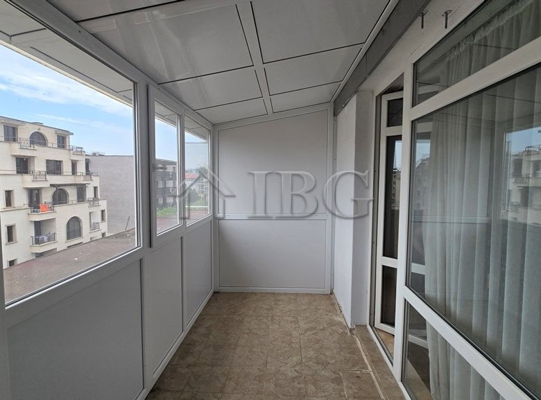 Bright balcony with views of Sunny Beach buildings and clear skies.