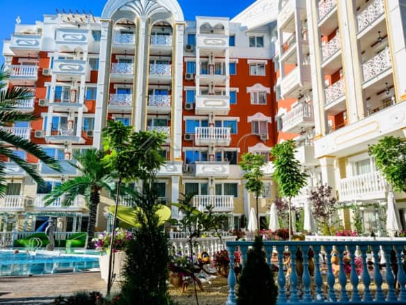 Modern 1-bedroom apartment in Sunny Beach with stylish design and spacious balconies.
