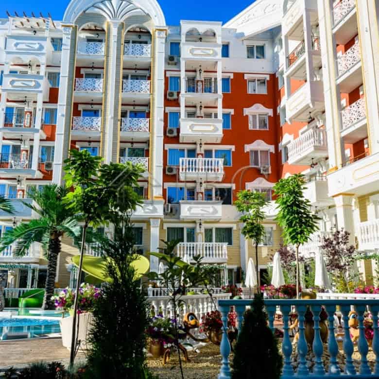 Modern 1-bedroom apartment in Sunny Beach with stylish design and spacious balconies.