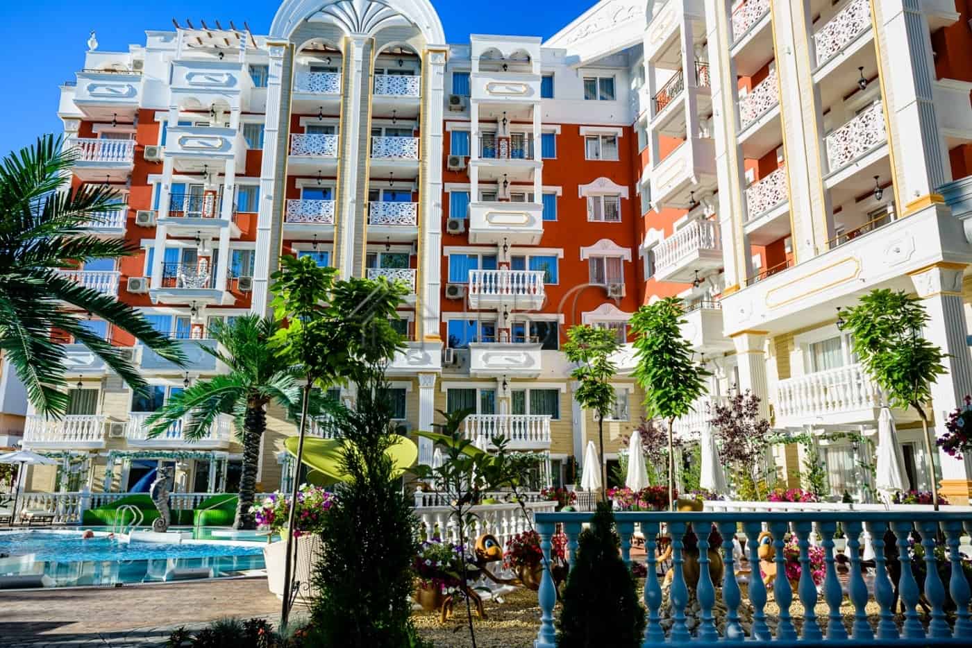 Modern 1-bedroom apartment in Sunny Beach with stylish design and spacious balconies.
