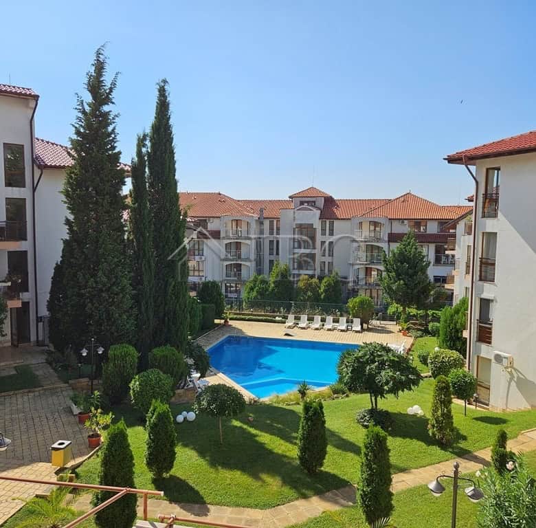 Pool view 1-bedroom apartment for sale in Complex Compass, Sveti Vlas, Dinevi Resort with lush garde.