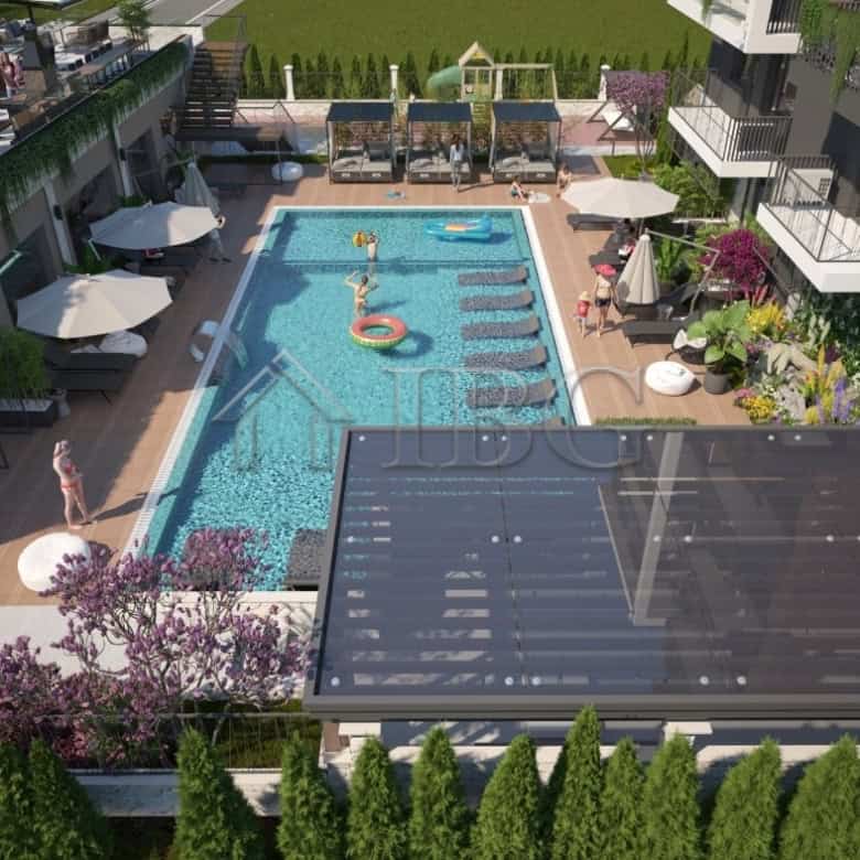 Bright one-bedroom apartment for sale in Sunny Beach with access to a shared pool and lush garden su.