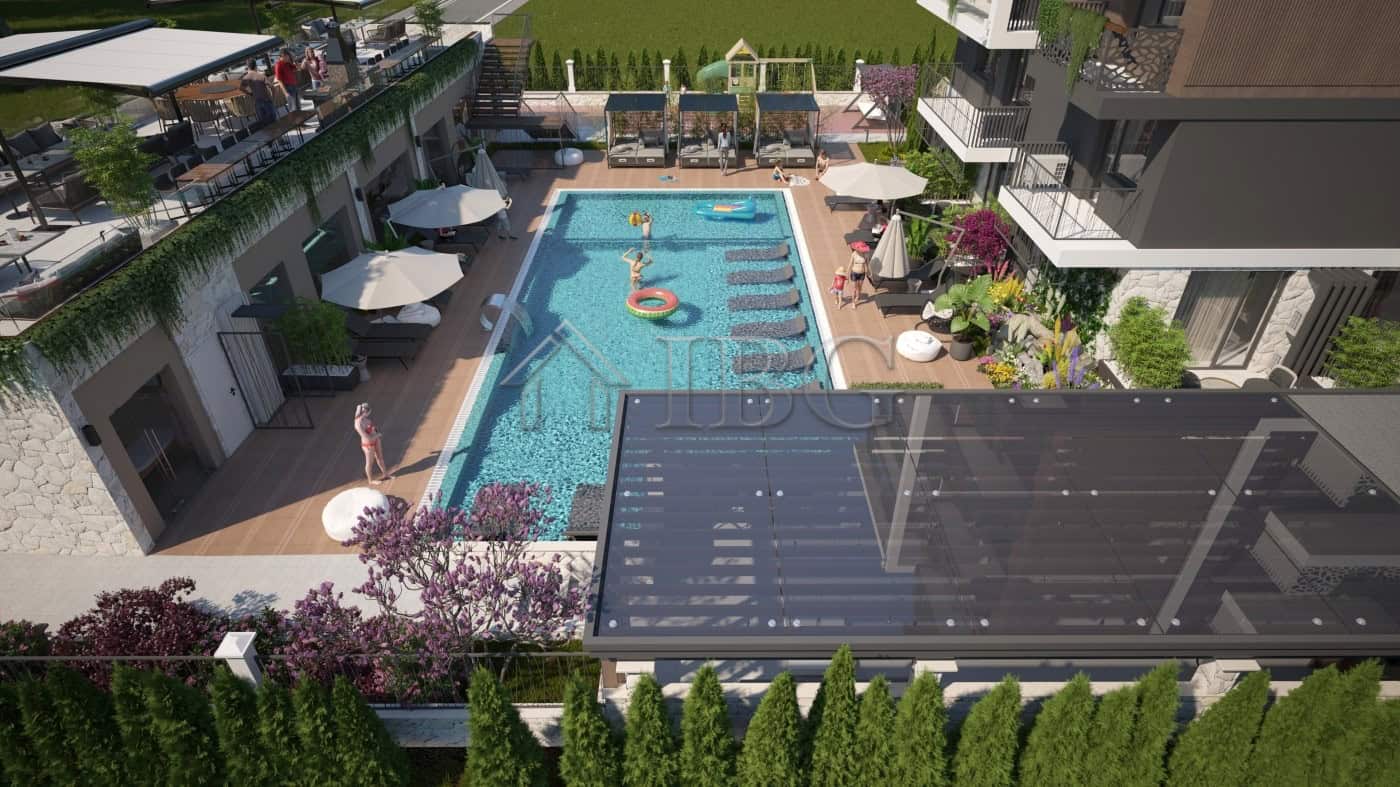 Bright one-bedroom apartment for sale in Sunny Beach with access to a shared pool and lush garden su.