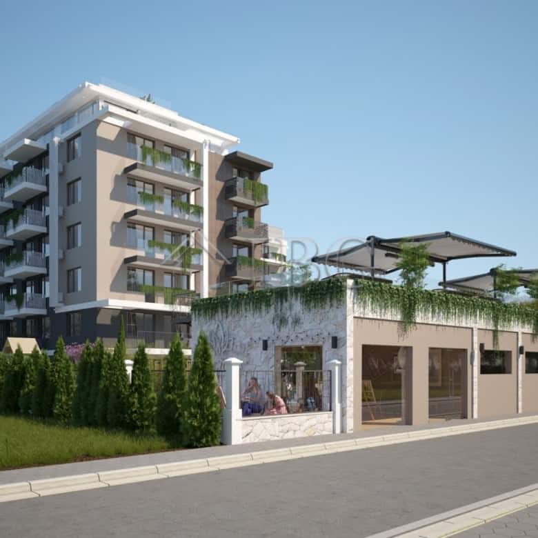 Spacious apartment with balcony views, located near beaches and amenities.