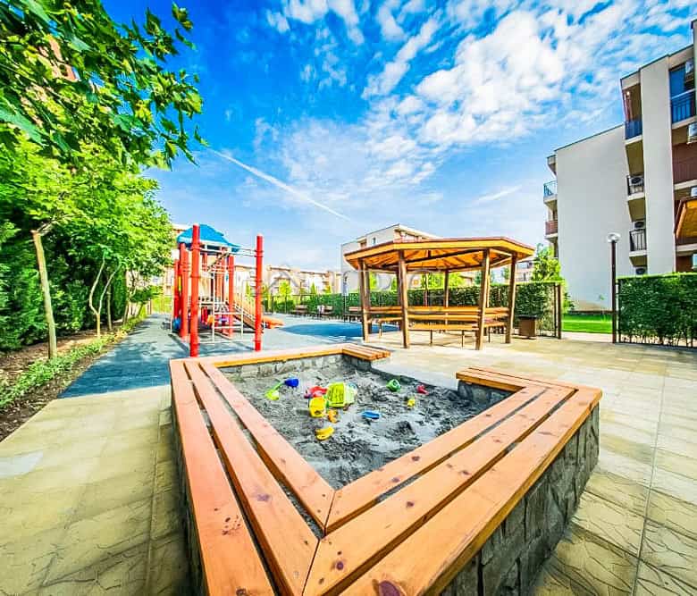 Bright studio with pool view at Orchid Fort Club, Sunny Beach. Modern amenities and relaxing outdoor.
