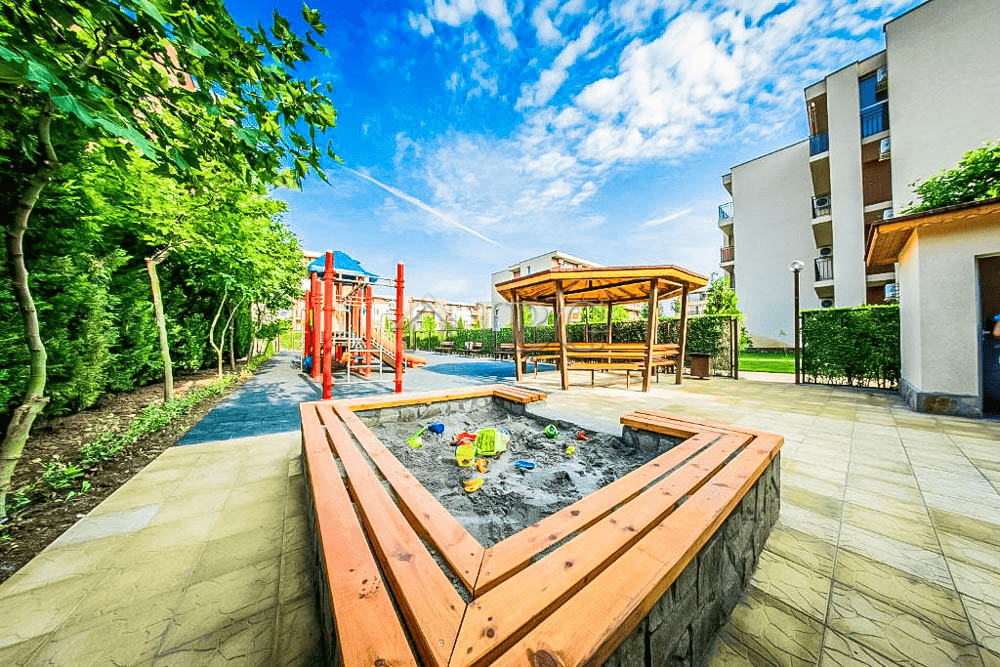 Bright studio with pool view at Orchid Fort Club, Sunny Beach. Modern amenities and relaxing outdoor.