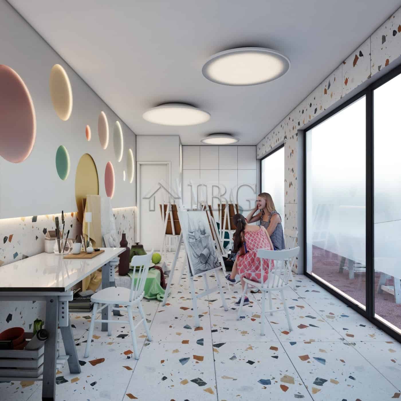 Bright, colorful living space with artistic wall decor and large windows offering scenic views.