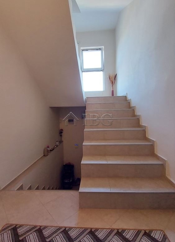 Bright staircase inside family home in Burgas' Meden Rudnik district.