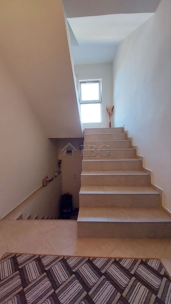Bright staircase inside family home in Burgas' Meden Rudnik district.