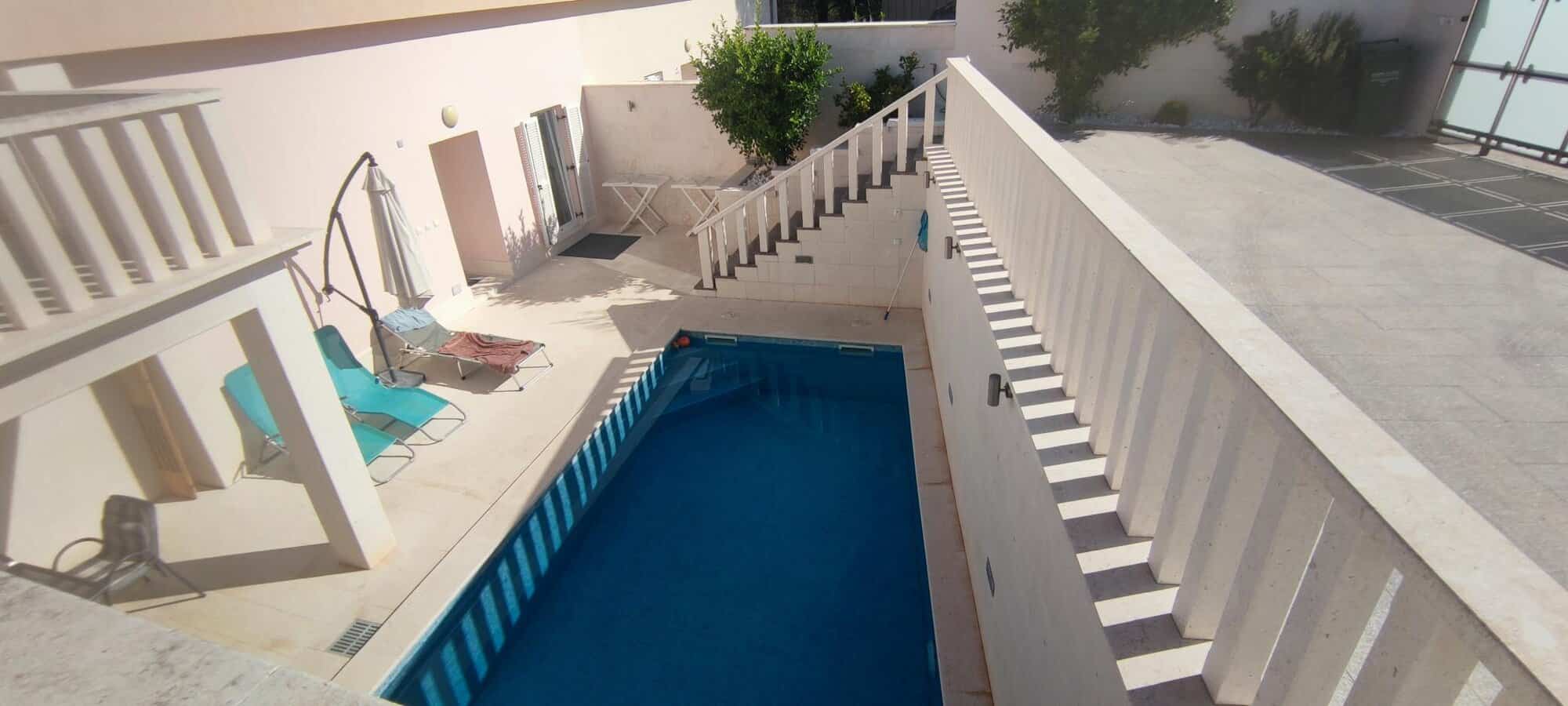 Modern apartment with private pool in a small complex in Okrug Donji, Croatia.