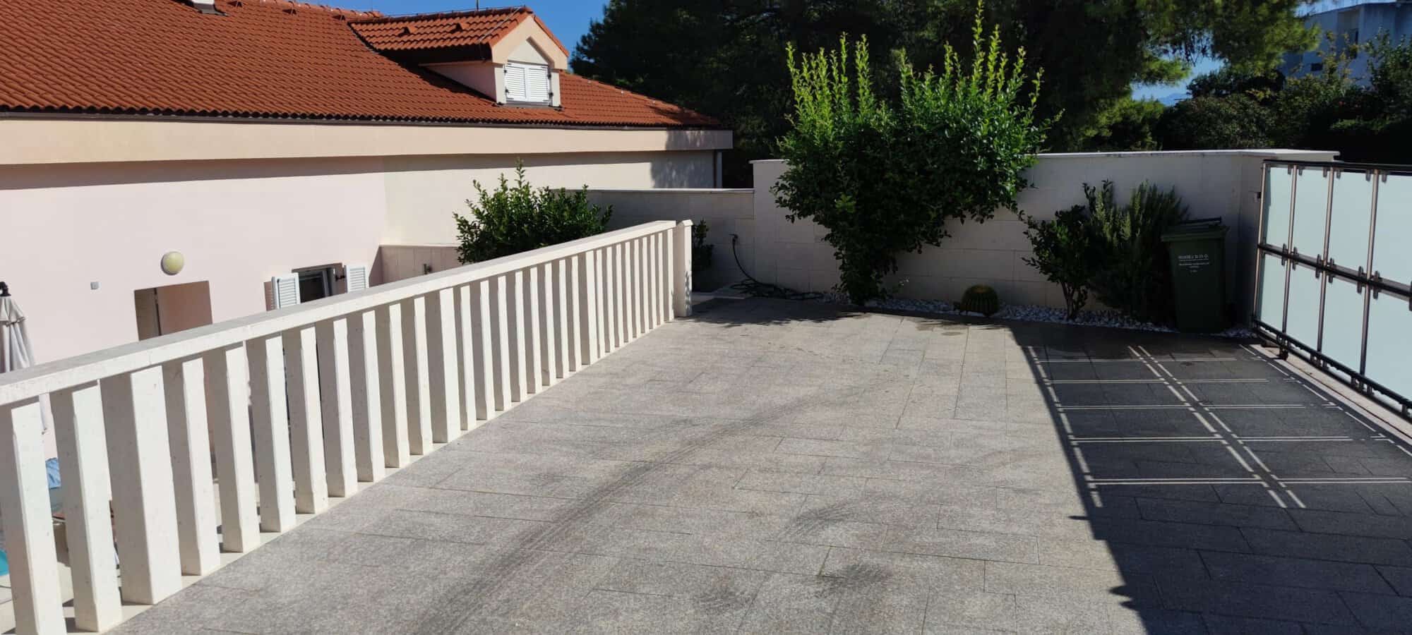Spacious terrace of a small apartment in Okrug Donji Croatia for sale.