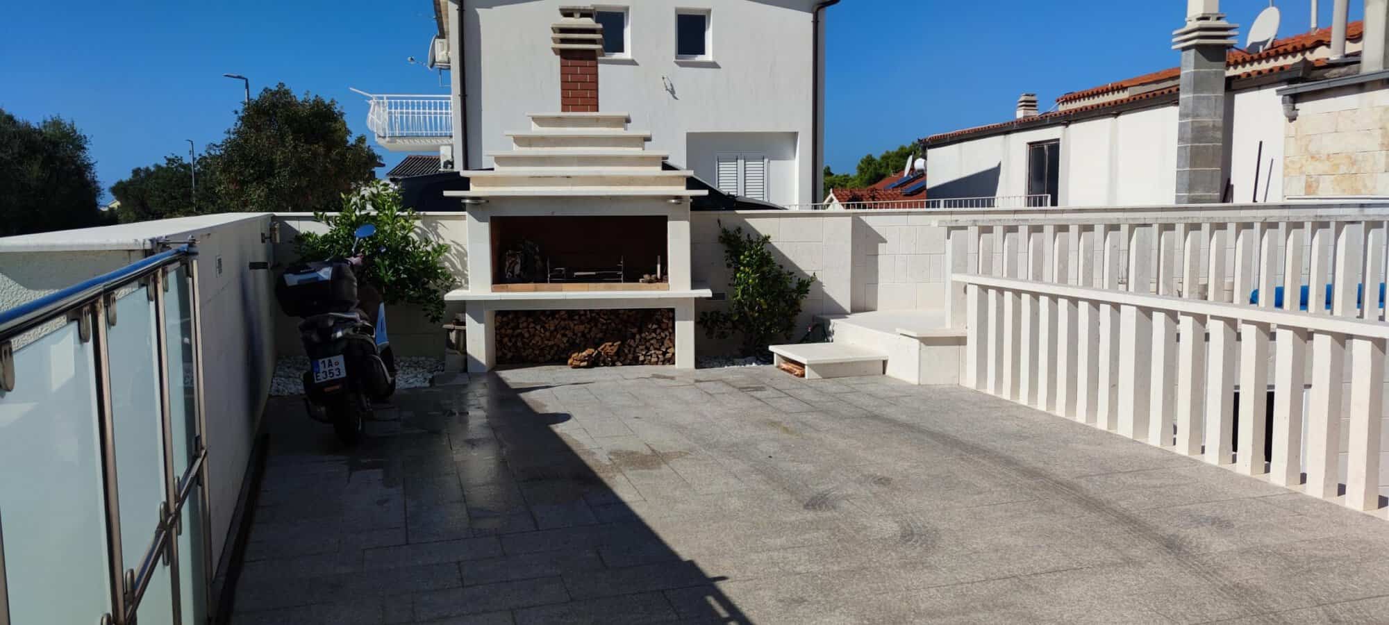 Terrace of a single apartment in a small residential building in Okrug Donji Croatia.