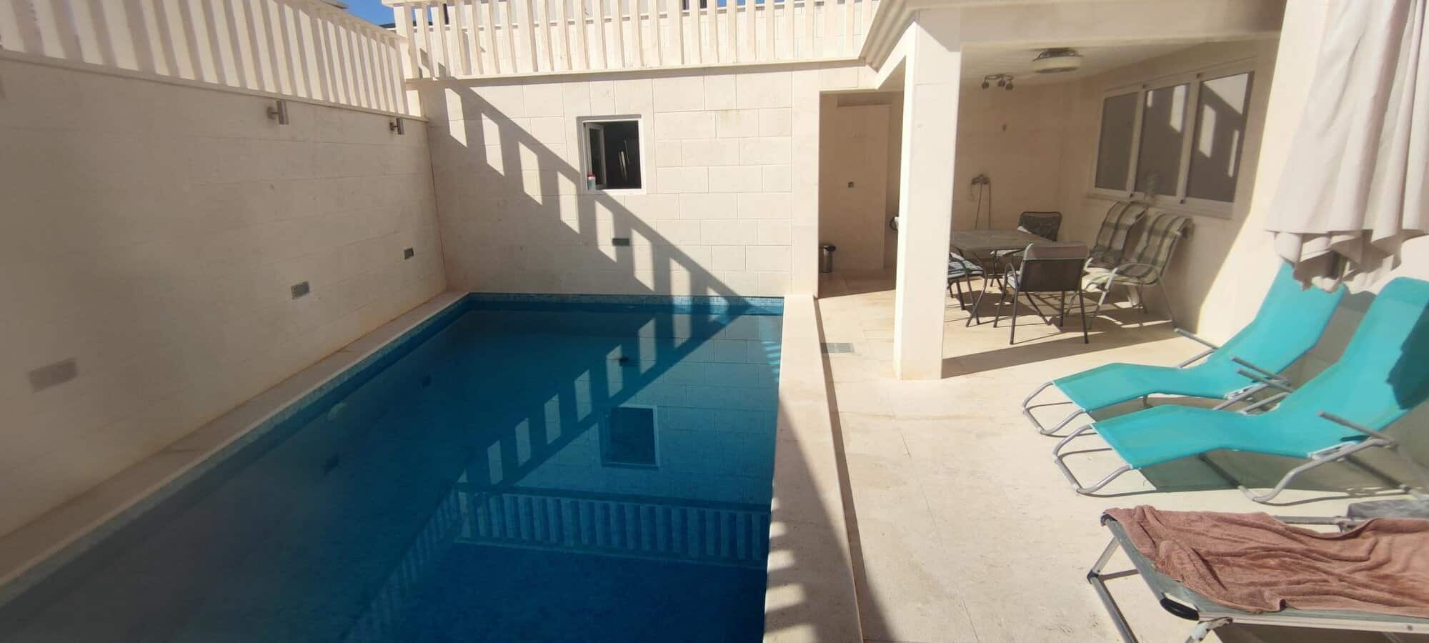 Cozy apartment with private pool and outdoor seating in Okrug Donji Croatia.
