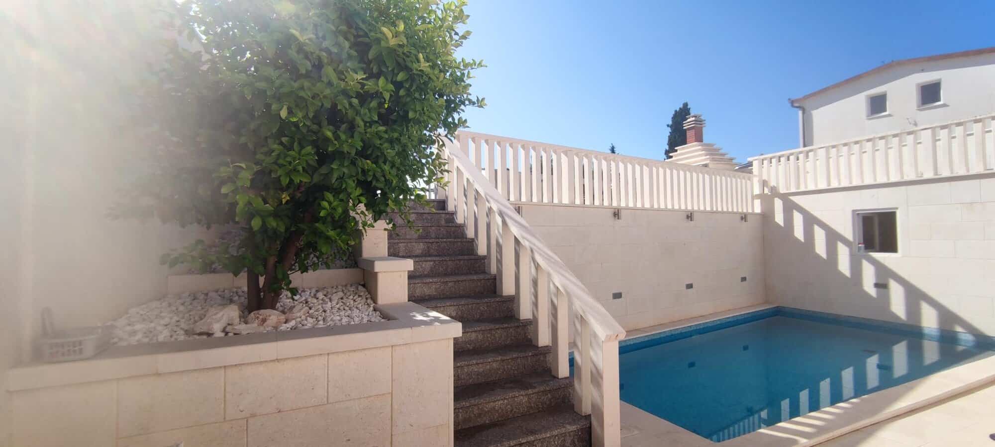 Apartment with private pool and outdoor stairs in Okrug Donji Croatia.