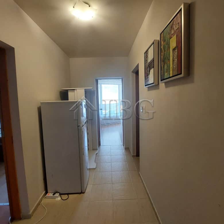 Apartment interior with refrigerator and hallway in Sea Grace Complex, Sunny Beach.