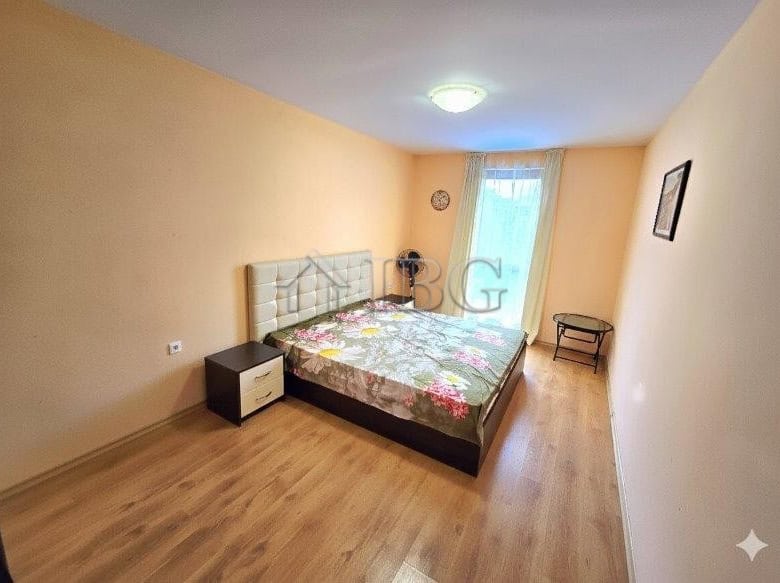 Bright bedroom with pool view in Sunny Home 2, Sunny Beach.