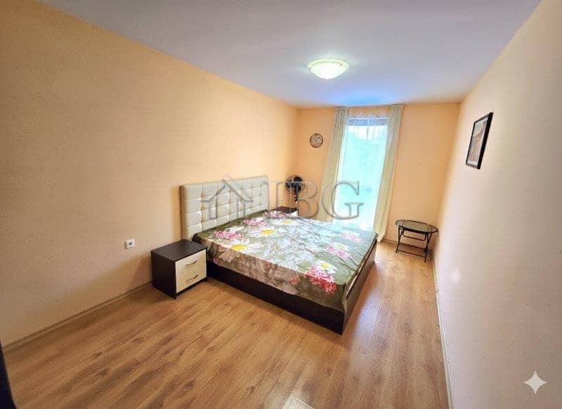 Bright bedroom with pool view in Sunny Home 2, Sunny Beach.