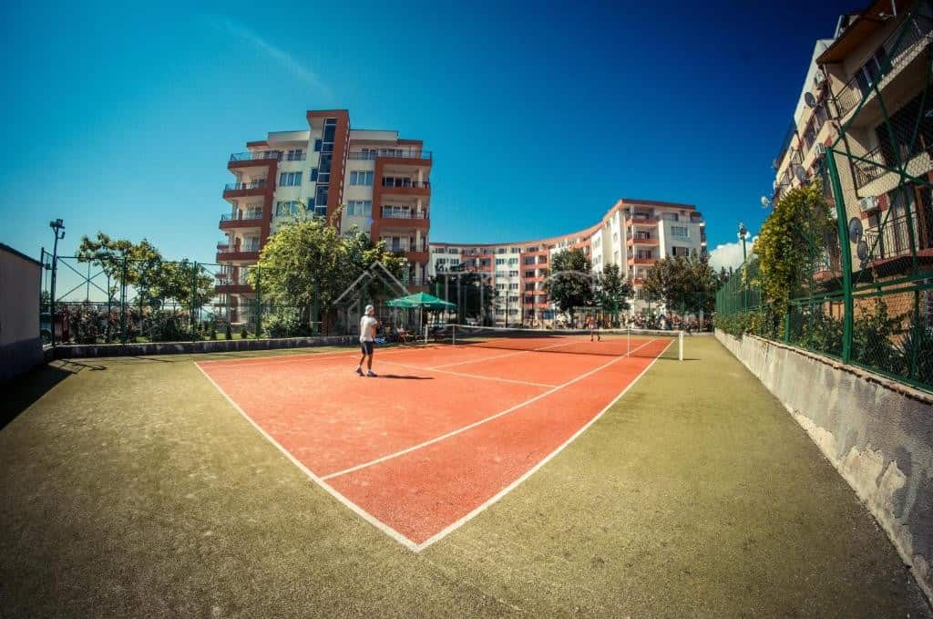 Tennis court in a residential area close to the sea at Riviera Fort Beach, Ravda.