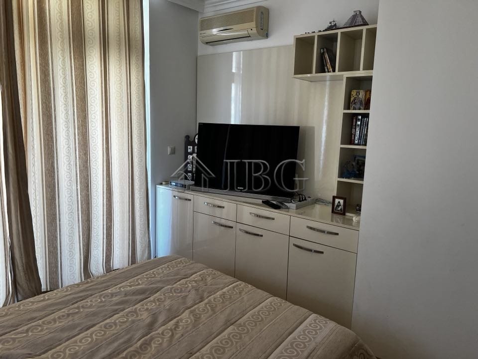Sea view 2-bedroom apartment in Sveti Vlas, Bulgaria, with modern furnishings and balcony overlookin.
