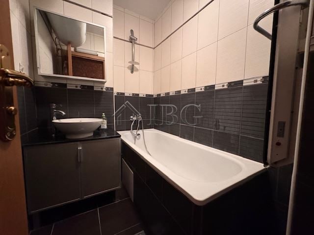 Bright bathroom with modern fixtures in a 1-bedroom apartment located in Vazrazhdane district, Burga.