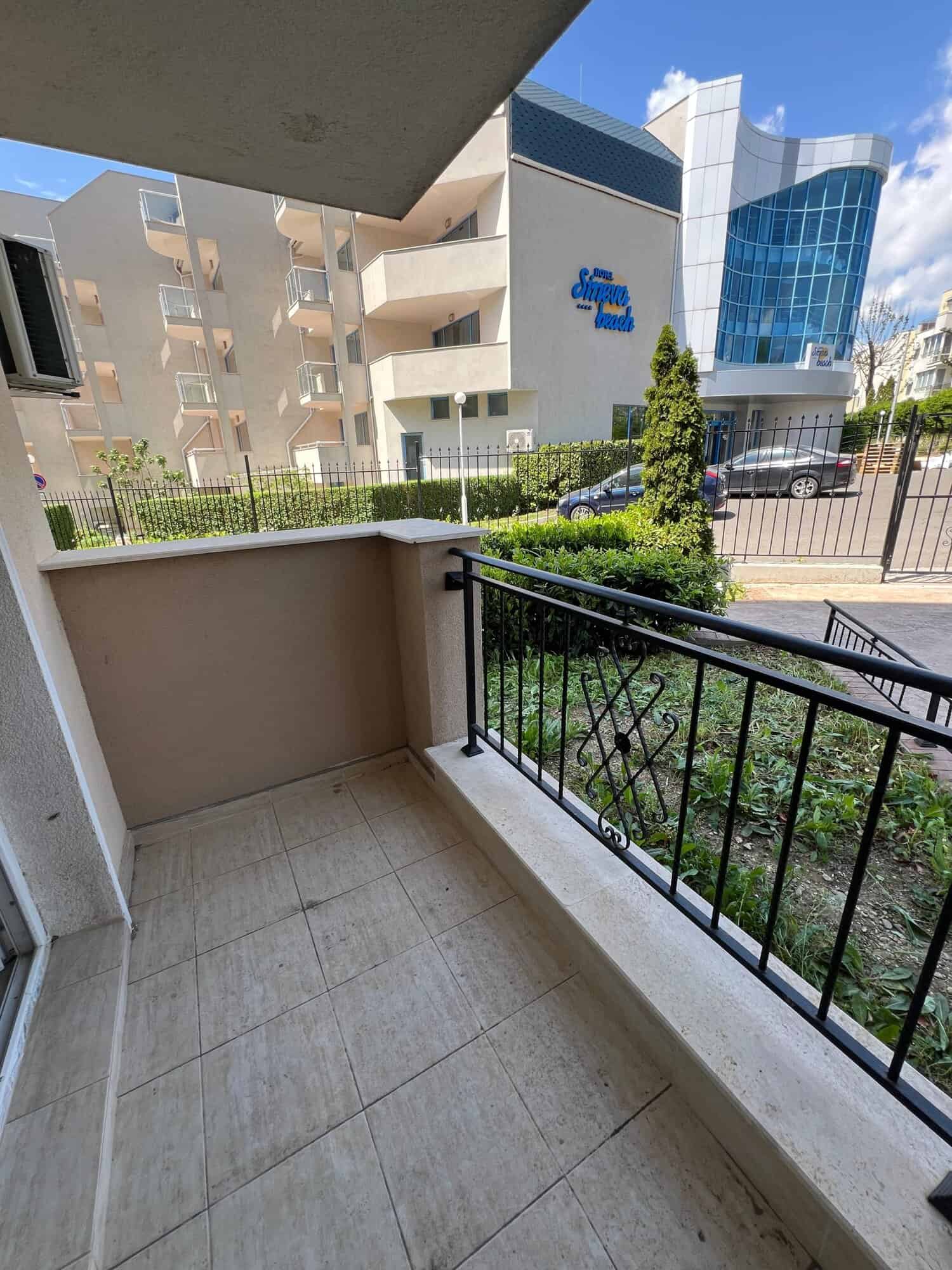 Balcony view of modern residential complex in Saint Vlas near Ipanema Beach.