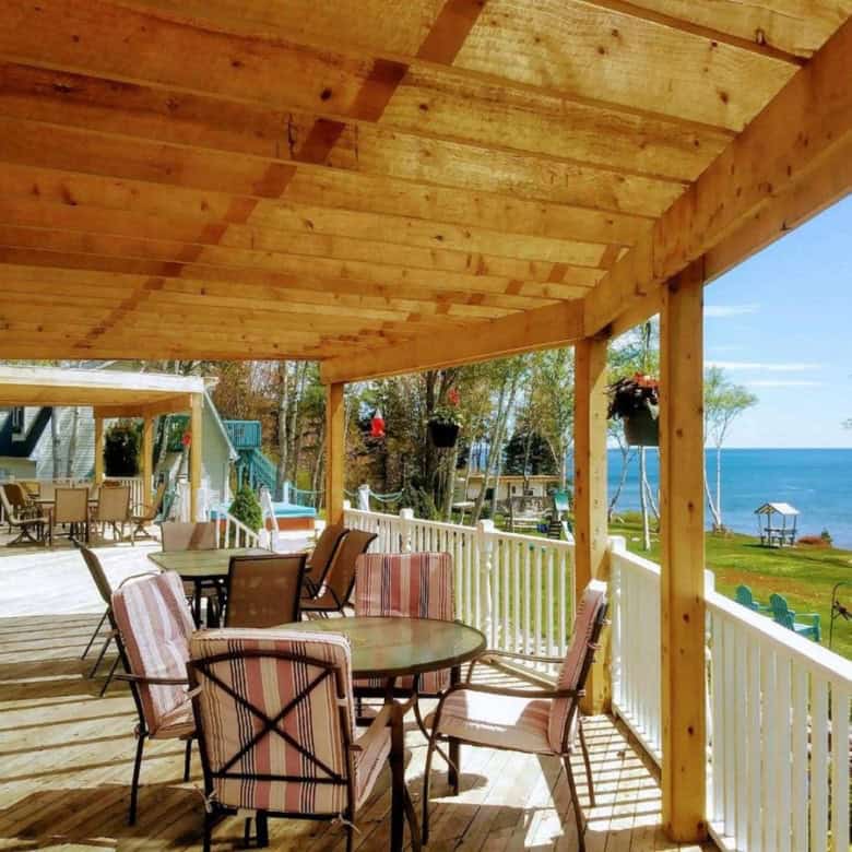 Ocean view porch at Sea Parrot Ocean View Manor in Englishtown, Nova Scotia, Canada.