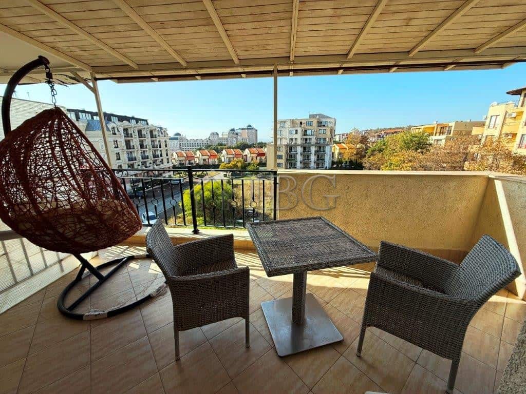 Balcony view of South Bay with outdoor seating and swing chair in Sveti Vlas.