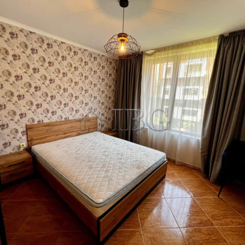 Bright 2-bedroom apartment in Helios Complex, Sveti Vlas, with modern furnishings and large windows.