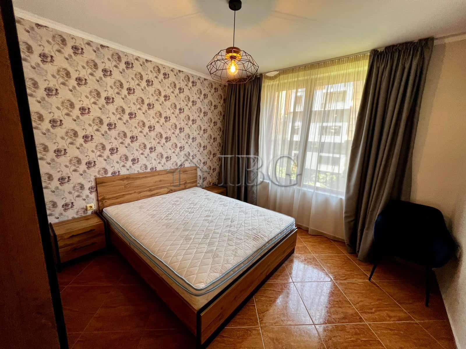 Bright 2-bedroom apartment in Helios Complex, Sveti Vlas, with modern furnishings and large windows.