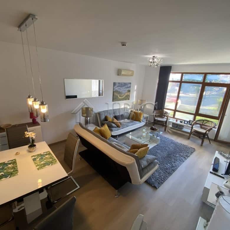 Modern apartment with private yard in Vineyards Resort, Aheloy. Bright living space, stylish furnitu.
